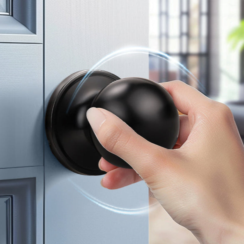 Hand holding KNOBWELL Round Ball Black Passage Door Knobs For Interior