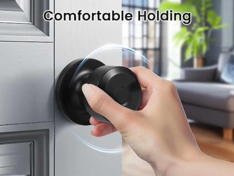 Hand holding KNOBWELL Matte Black Interior Passage Door Knobs